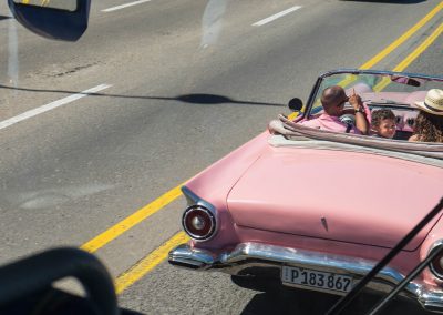 Kid in pink convertable